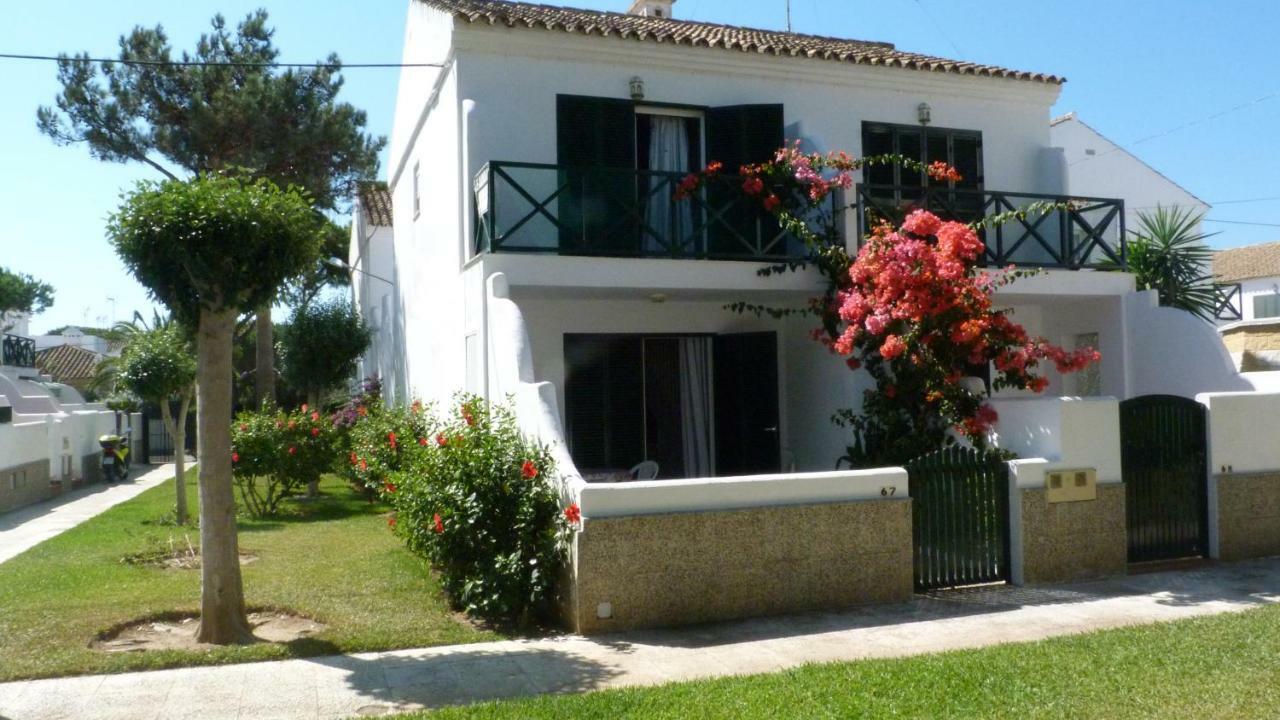 Сasa de vacaciones Casa Adosada En Playa La Barrosa Urbanización Las Arenas 67 *